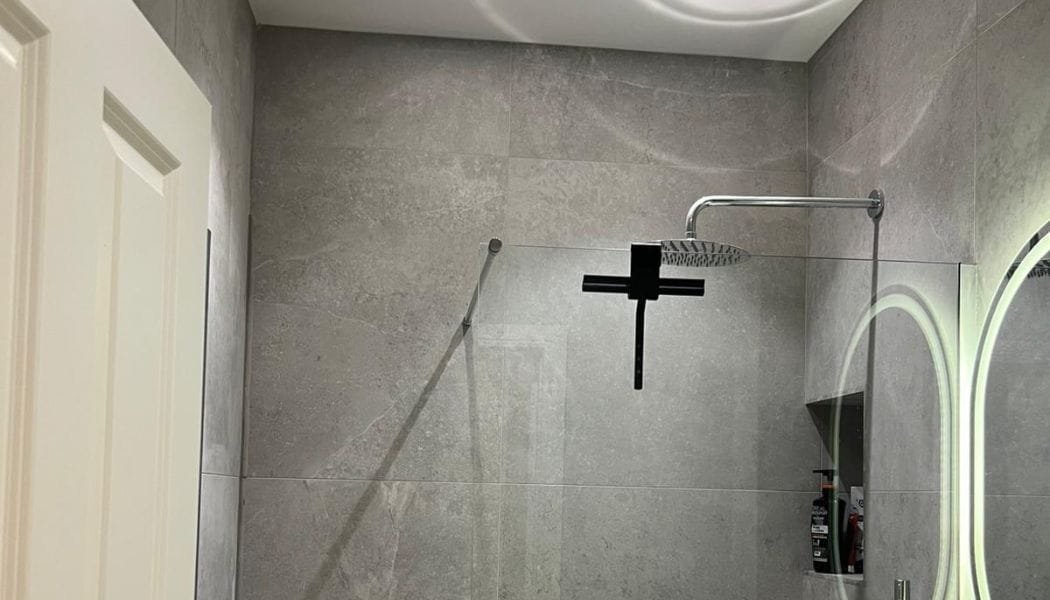 This full bathroom renovation project features a modern design, blending sleek fixtures and contemporary finishes. The transformation includes a complete overhaul of plumbing, tiles, and layout, creating a luxurious and functional space. Whether upgrading a small powder room or a spacious master bath, our expert team at Beck's Homes UK brings your vision to life with precision and style.