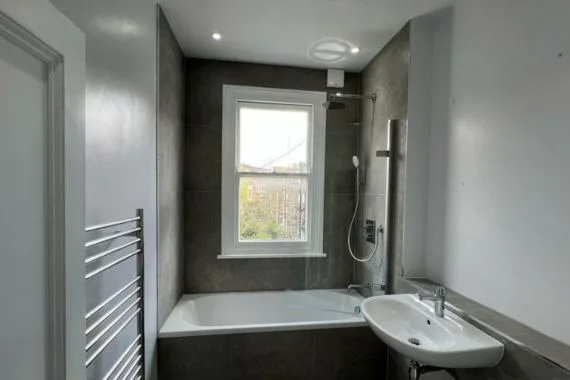 Full bathroom renovation project showcasing modern design with elegant fixtures and stylish finishes.
